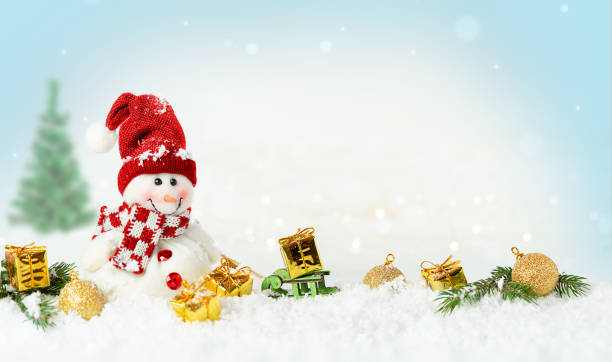 istock Snowy Christmas background with snowman 1349717014