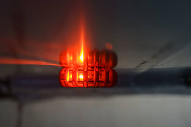 Accidents and danger. A burning red lamp on the wall indicates danger.