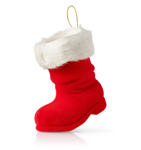 Empty Santa boot, Christmas decorations isolated on white background.