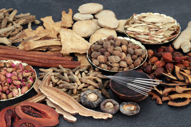 istock Natural Chinese Herbal Medicine with Acupuncture Needles 1349719861