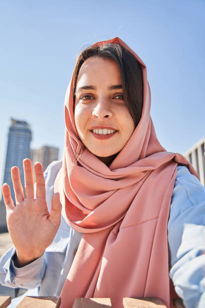 istock Female blogger greeting with her subscribers while recording her video blog 1349728630