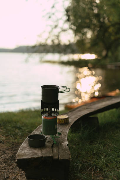 istock Coffee break on a forest trip. Lakeshore view 1349729244