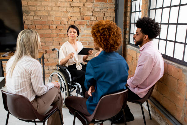 istock woman in wheelchair working 1349744452