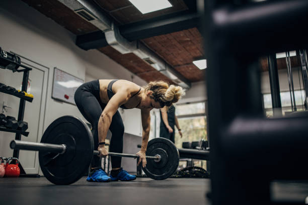 istock Strong woman training in gym 1349745007