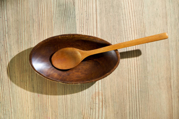 istock wooden bowl  oval shape  on table top 1349751441
