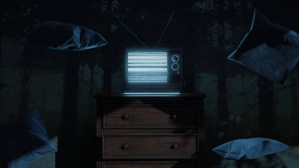 istock 3d rendering of a haunted room with an old television and bright screen. Surrounded by flying pillows 1349765742