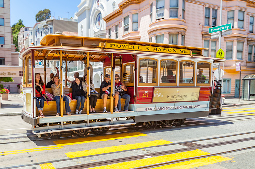 San Francisco, USA - June 20, 2012: Famous Cable Car Bus near Fisherman's Wharf in San Francisco, California. Cable car trains first began operating in the city in 1873.