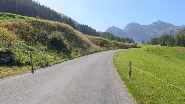 istock Scenic view of mountain road in summer 1349766335