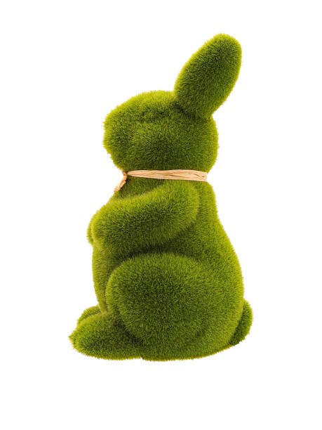 istock Figure of green sitting rabbit left profile view isolated 1349766933