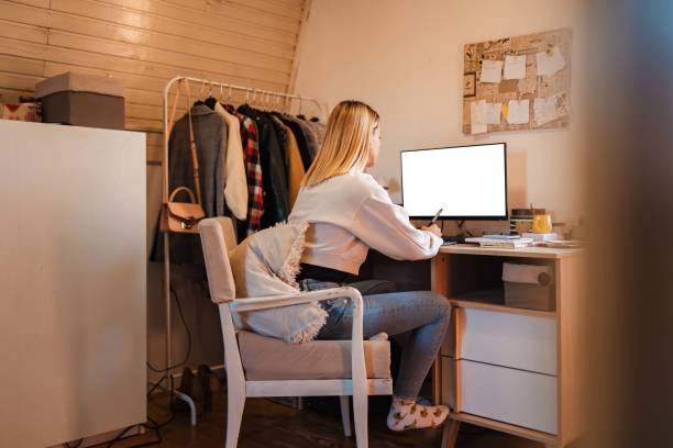 istock Dedicated female graphic designer working on a new project in her home office 1349767448