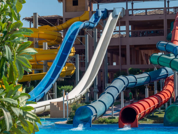 istock Water park with colorful water slides and pool. 1349772729