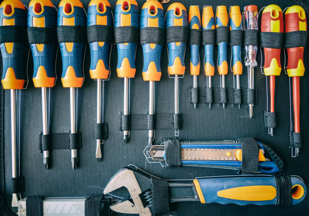 istock Screwdrivers set in a toolbox. DIY, maintenance service works concept, top view 1349773050