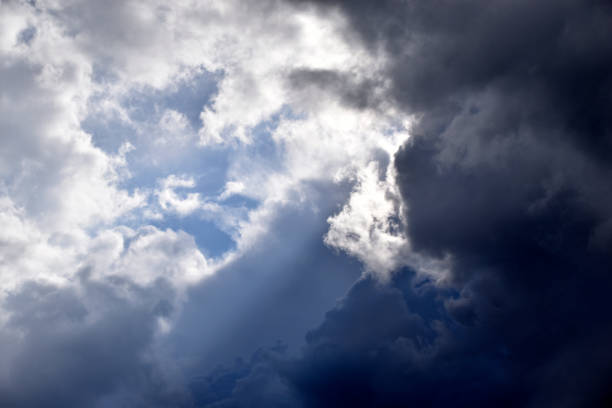 istock Blue and white cumulus storm clouds thunderstorm landscape 1349773144