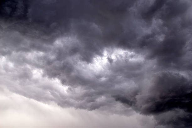 Blue and white cumulus storm clouds thunderstorm landscape