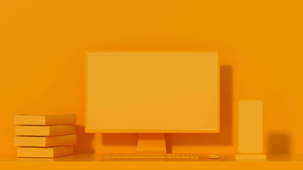 istock Empty computer screen monitor and smart phone on orange background, minimal concept 1349779206