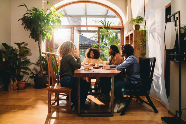 istock A group of friends during a dinner party together 1349785872