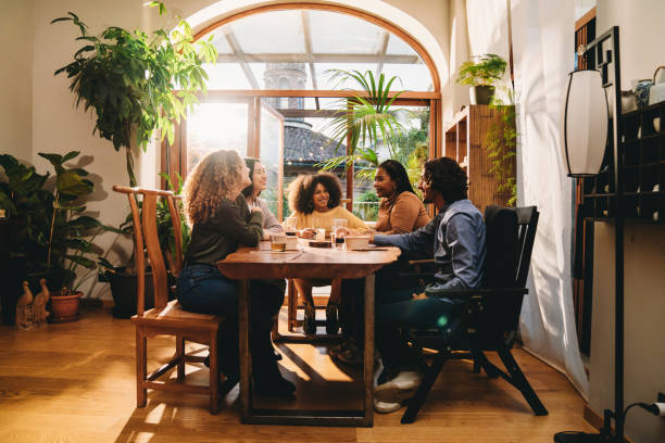 istock A group of friends during a dinner party together 1349785887