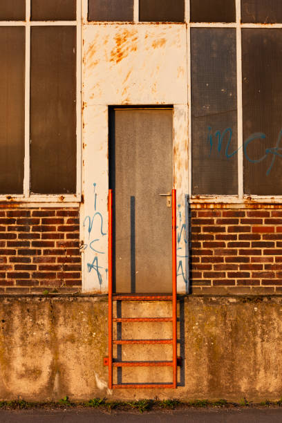 istock Building entrance with ladder 1349788811