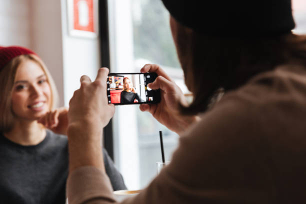 istock Back view of Man making photo 1349789876