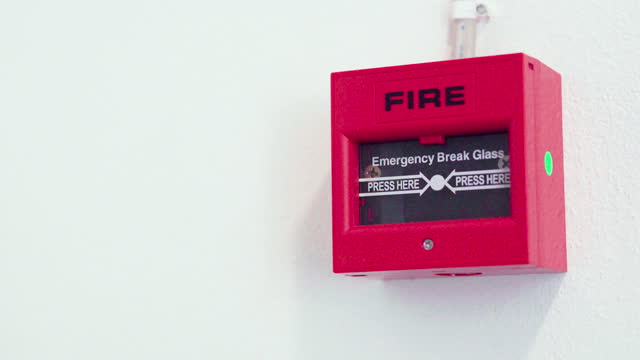 Fire alarm on the wall - Emergency break glass