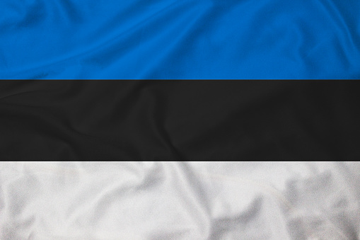 Flag of Estonia, background with fabric texture