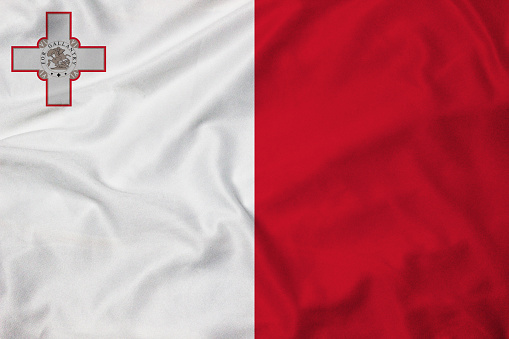 Flag of Malta, background with fabric texture