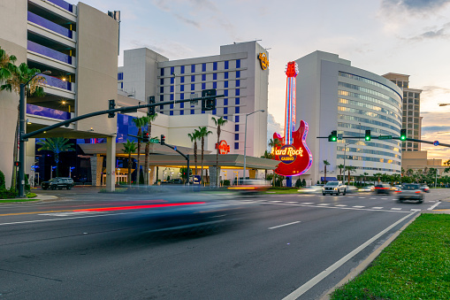 Biloxi, Mississippi, USA - June 30, 2021: Biloxi strip with casinos including Hard Rock, with street motion blur.