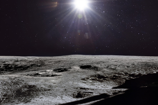 Moon surface and stars with sunlight in outer space. Exploration of Solar system. Artemis lunar space program. Elements of this image furnished by NASA (url: https://www.hq.nasa.gov/alsj/a16/a16pan1240222dmh.jpg)