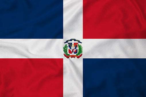Flag of the Dominican Republic, background with fabric texture