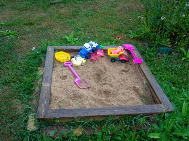 istock sandbox with plastic toys in the village 1349805158