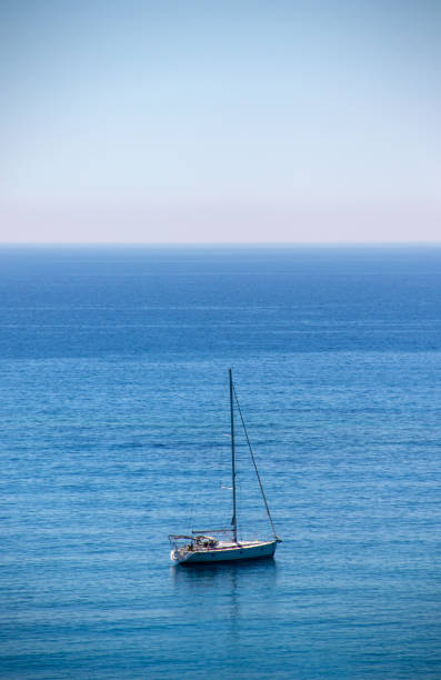 istock Sail boat in a bay in Greece 1349806900