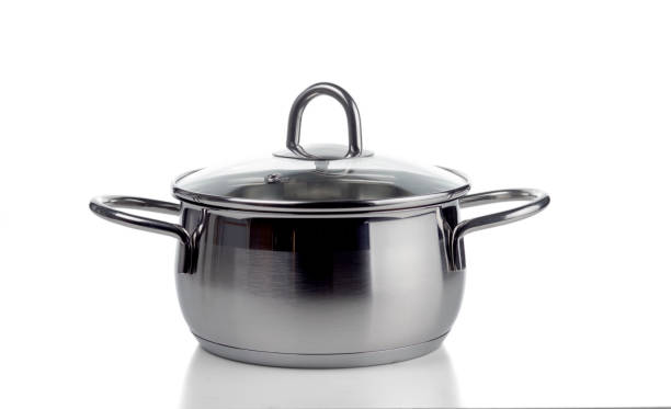 Stainless steel pan with the glass lid. Isolated on white background.