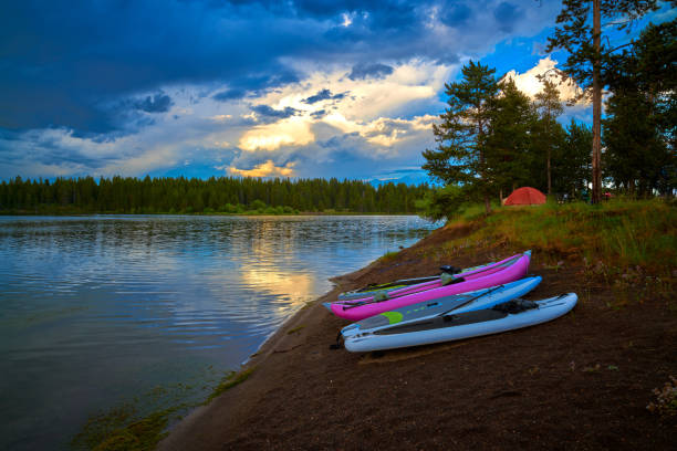 father and son kayaking on mountain wilderness lake, square frame (XXXL)