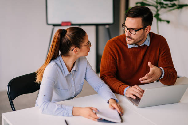 istock Young businessman working with his colleague 1349809124