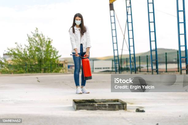People In The Extinguisher Training Program Stock Photo - Download Image Now - Fire - Natural Phenomenon, Fire Extinguisher, Extinguishing