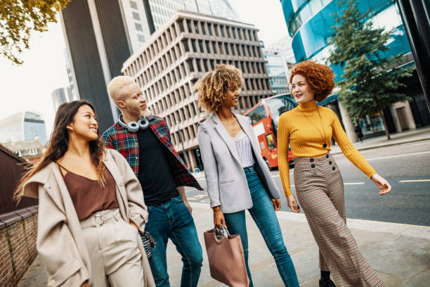 istock Multi ethnic group of young people outdoors, after reopening 1349815666
