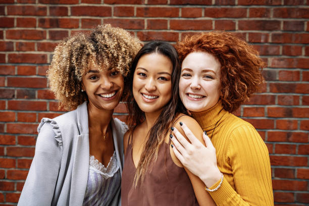 istock Diverse millennial friends smiling 1349816399
