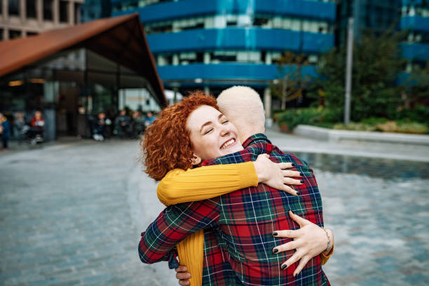 istock Beautiful diverse couple sharing emotions and hugging 1349816563