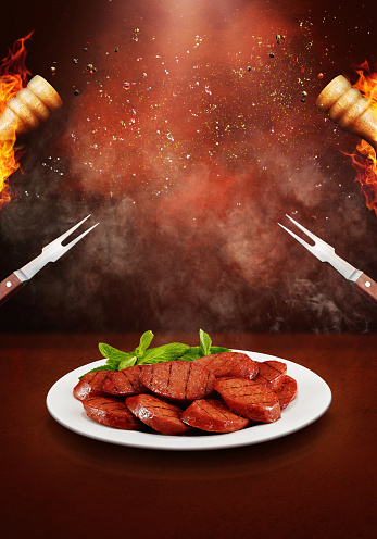 Sausages on a hot and spicy background