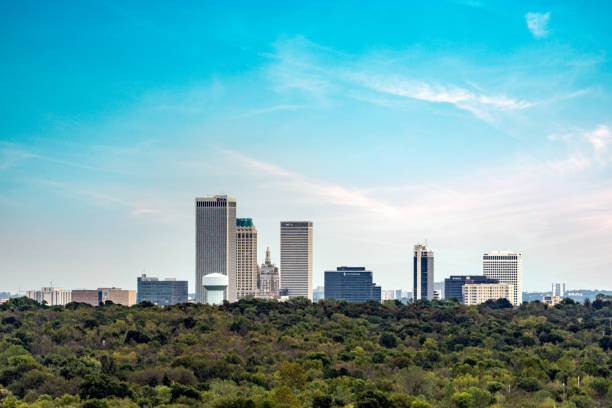 Tulsa Oklahoma cityscape skyline Tulsa, Oklahoma USA - October 21, 2021: Clean view of the Tulsa cityscape skyline. The downtown district has many skyscrapers and businesses. tulsa landmark stock pictures, royalty-free photos & images