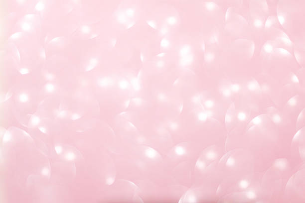 istock Defocused pink silver, pink rose bokeh,circle abstract light background, shining lights, sparkling glittering Valentines day,women day,event lights romantic backdrop.Blurred abstract holiday backdrop 1349817575