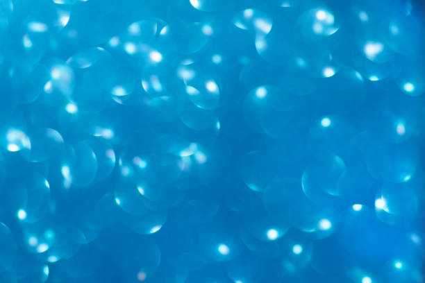 istock Defocused christmas or party, blue glitter background with bokeh. Holiday glowing backdrop,banner or card 1349819626