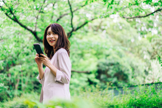 https://media.istockphoto.com/id/1349849487/photo/businesswoman-using-her-phone-outside.jpg?b=1&s=170667a&w=0&k=20&c=yz9HCy-REIIUPXzr9QSxJ-IU4k8sU-4BgqQC2ibK1Rc=