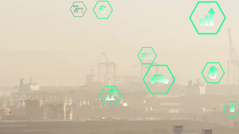 Multiple green energy icons floating against aerial view of cityscape