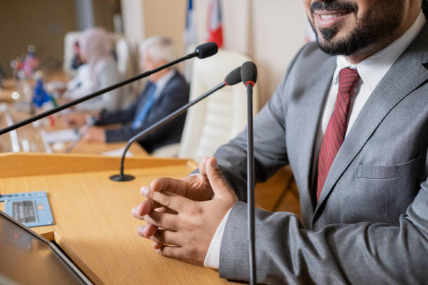 istock Male Politician Answering Questions 1349854604