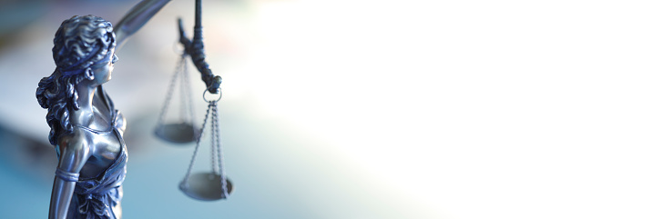 Lady justice photographed with a very shallow depth of field.