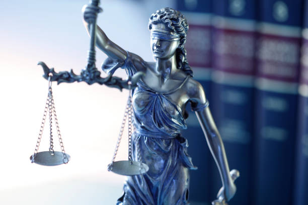 istock Lady Justice In Front Of Law Books 1349860031