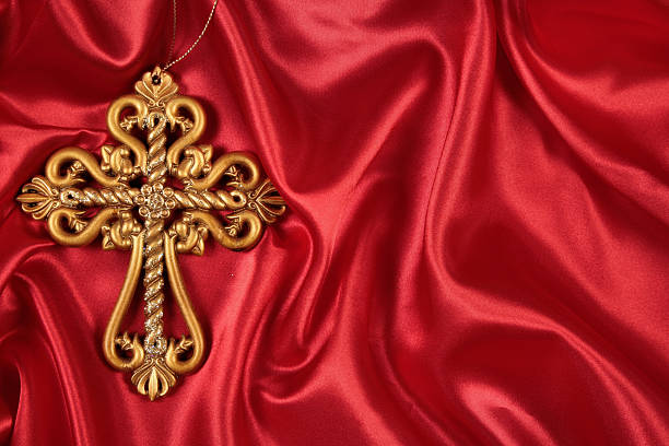 istock Religious: Gold ornate Cross on Red satin 134986961