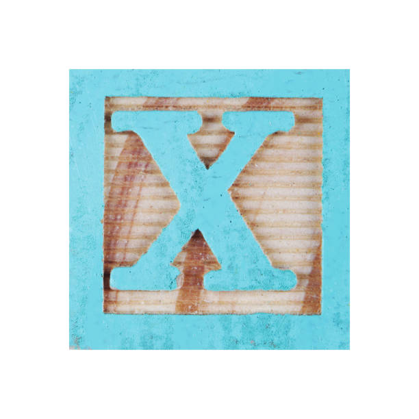 istock Letter X childs wood block on white with clipping path 1349874251