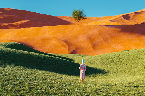 Surreal landscape with woman in bathrobe standing in the grass. 3D generated image.